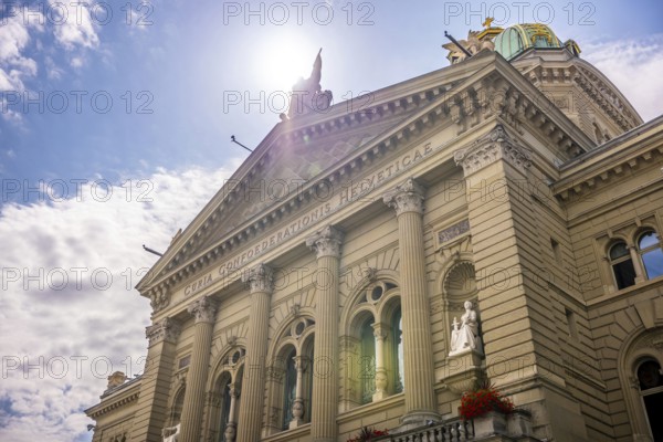 Beautiful Bundeshaus Parliament Building or Federal Palace in a Sunny Day with Sunlight and Lens Flare in City of Bern, Canton Bern, Switzerland