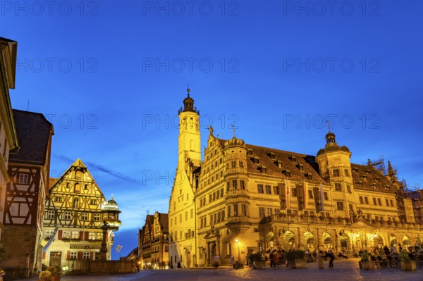 Town hall and town hall tower in Rothenburg ob der Tauber at dusk, Bavaria, Germany