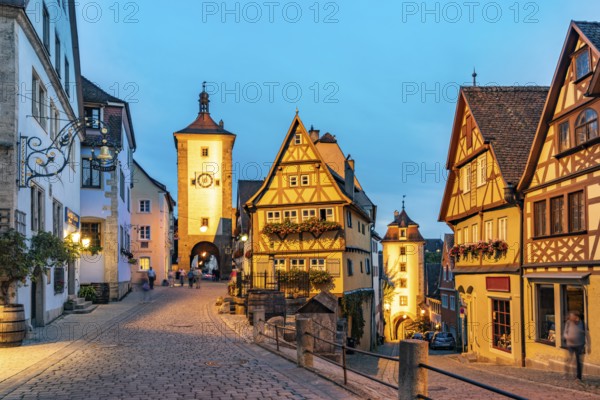 Plönlein Square with the Sieberstor and the Kobolzell Tor at dusk, Rothenburg ob der Tauber, Bavaria, Germany