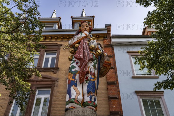 Hansel, historical figure of the Donaueschingen Fasnach on the Hansel fountain in Donaueschingen, Baden-Württemberg, Germany