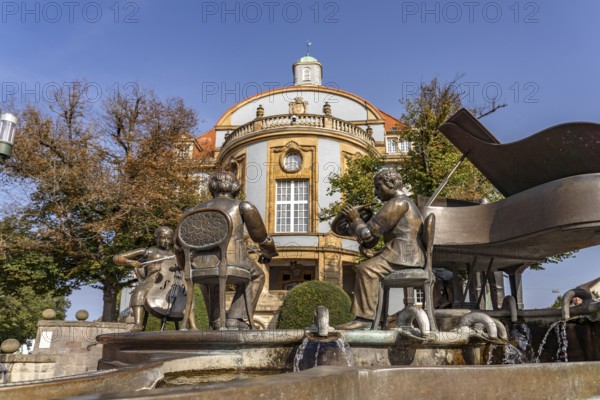 Musicians' fountain in front of the Blue Town Hall in Donaueschingen, Baden-Württemberg, Germany
