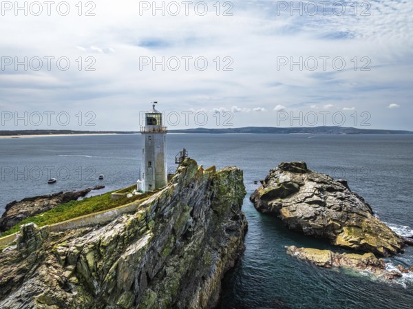 Godrevy Lighthouse from a drone, Godrevy Island, St Ives Bay, Cornwall, England, United Kingdom