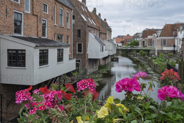 Hanging kitchens above the Damsterdiep in the historic town of Appingedam, province of Groningen, Netherlands