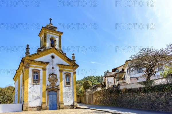 Street in the city of Ouro Preto between historic houses and churches, Ouro Preto, Minas Gerais, Brazil