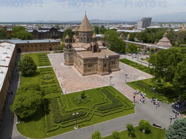 An impressive church with surrounding gardens, in the centre of visitors and urban surroundings, aerial view, historic, most important Armenian Orthodox cathedral, UNESCO World Heritage Site, Echmiadzin, Echmiadzin, Ejmiacin, Vagharshapat, Vagharshapat, Vagharshapat, Valaršapat, Vagharshapat, Armavir province, Armenia