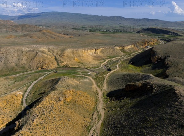 Aerial view of a vast mountain landscape with roads and little vegetation, aerial view, landscape at Angel's Canyon, gorge, Dashtakar, Ararat Province, Armenia