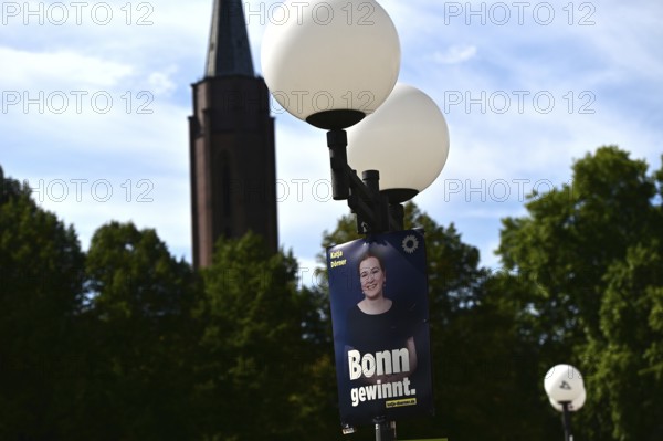 Posters for the North Rhine-Westphalia municipal election campaign in Bonn around the Hofgarten in the university district. Poster of the Green politician Katja Dörner