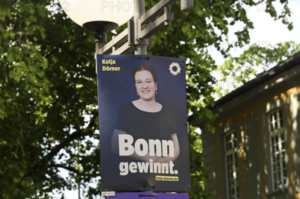 Posters for the North Rhine-Westphalia municipal election campaign in Bonn around the Hofgarten in the university district. Poster of the Green politician Katja Dörner