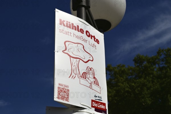 Posters for the North Rhine-Westphalia municipal election campaign in Bonn around the Hofgarten in the university district. Poster of the Left Party calling for cool places instead of hot air