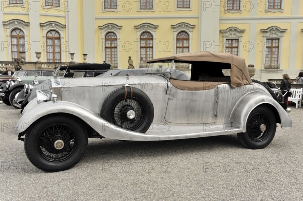Rolls-Royce Phantom I Colonial Style Open Tourer, Vintage car, Side view of a silver vintage convertible in front of a yellow facade, Retro Classics meets Baroque, Ludwigsburg, Baden-Württemberg, Germany