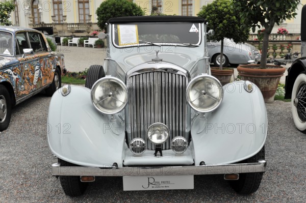 Bentley 4 ¼ Ltr. classic car, light grey convertible with open top in front of a historic building, Retro Classics meets Baroque, Ludwigsburg, Baden-Württemberg, Germany