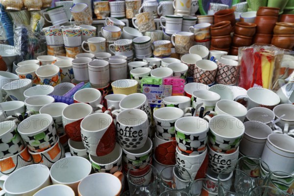 Udaipur, Rajasthan, North India, Asia, Large collection of stacked cups and dishes with colourful designs
