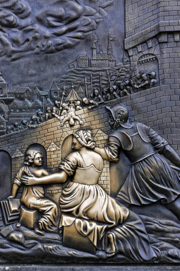 Prague, Czech Republic, Europe, Close-up of a medieval relief with figures and architectural elements