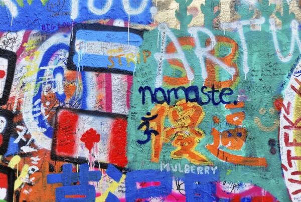 John Lennon Wall, Graffiti, Prague, Czech Republic, Europe, Colourful graffiti wall with flags and various lettering
