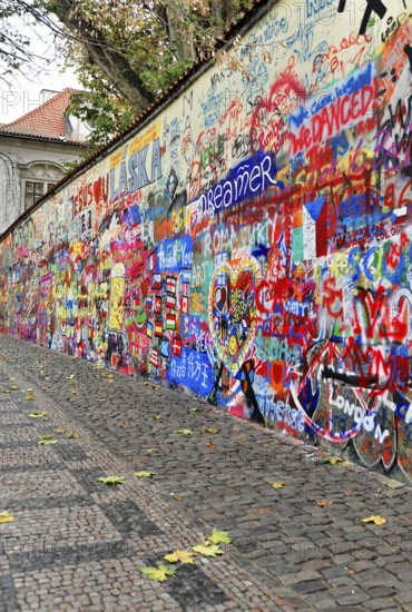 John Lennon Wall, Graffiti, Prague, Czech Republic, Europe, Long colourful graffiti wall in an urban environment with autumnal flair