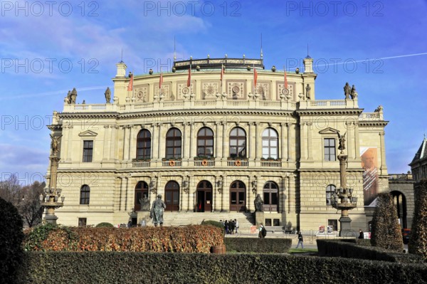 Exterior view of the Rudolfinum with people in front of it, historic building with elaborate classical façade, Prague, Czech Republic