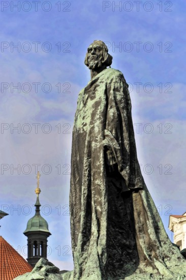 Jan Hus Monument on Old Town Square, Prague, Czech Republic, Europe, Historical statue of a man looking up to the sky, Czech Republic