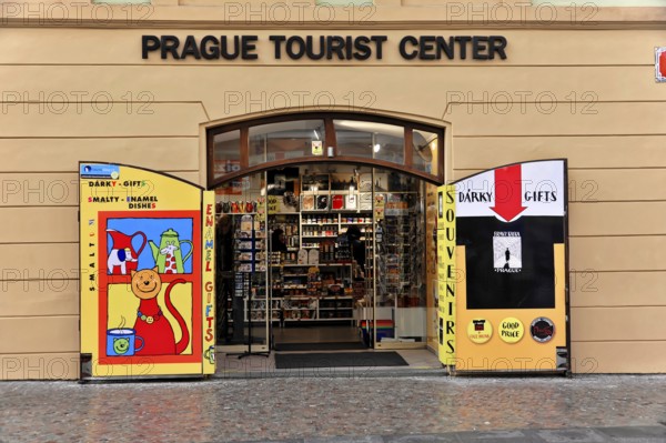 Prague, Czech Republic, Europe, Colourful shop front of a tourist centre with open doors and souvenirs in Prague