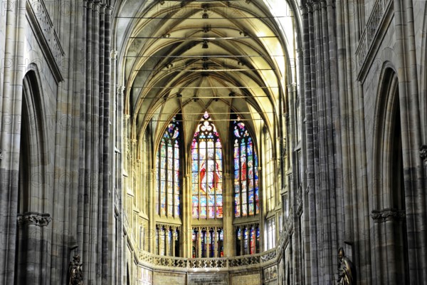 St. Vitus Cathedral, Hradcany, Prague, Czech Republic, Europe, Gothic church interior with ornate stained glass windows and high arches