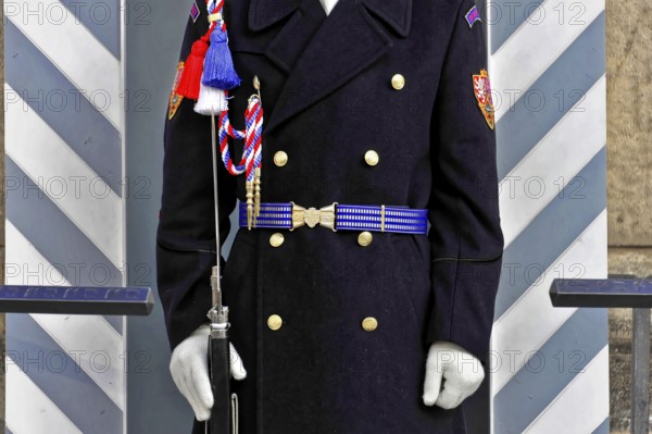Prague, Czech Republic, Europe, Ceremonially dressed soldier in blue uniform with conspicuous belt and white gloves