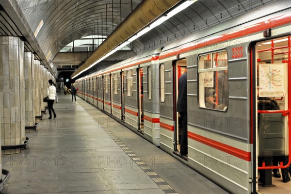 Mustek underground station, Prague, Czech Republic, Europe, Passengers boarding and alighting from a modern underground train