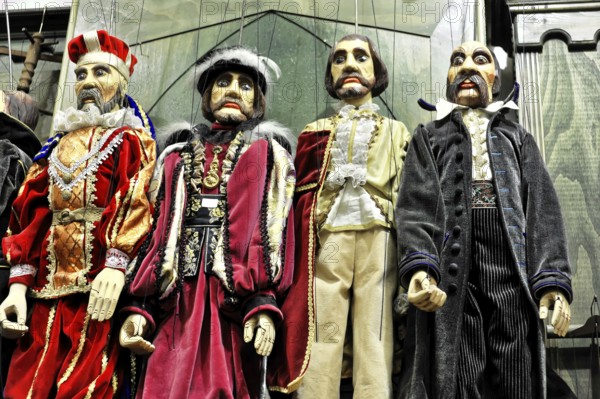 Prague marionettes, Prague, Czech Republic, Europe, Four marionettes dressed in historical costumes, serious expression, detailed clothing