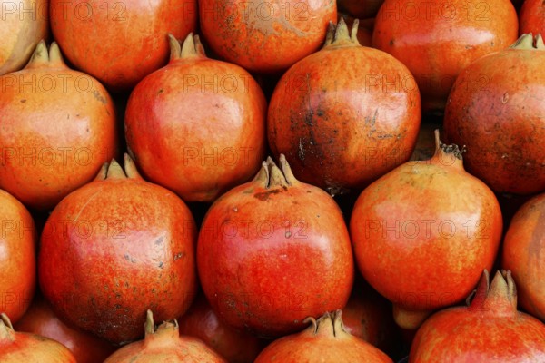 Kota, Rajasthan, North India, Asia, Ripe, red pomegranates close together, with a smooth surface and natural freshness, India