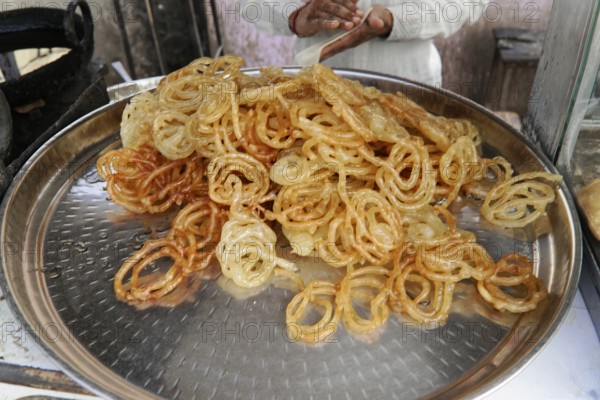 Kota, Rajasthan, North India, Asia, A tray of freshly prepared jalebis, a popular Indian sweet, India