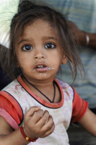 Kota, Rajasthan, North India, Asia, Little girl with natural expression and some dirt on her face, India