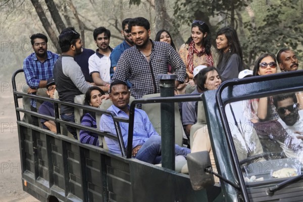 Ranthambhore Tiger Reserve, Sawai Madhopur, Kota, Rajasthan, North India, Asia, Group of people in an open vehicle on safari, India