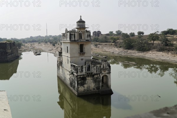 Kota, Rajasthan, North India, Asia, Historic tower in the middle of a lake with reflecting water surface, India
