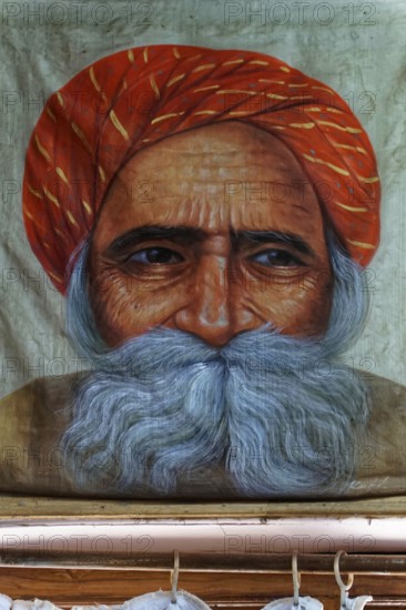 Painting, Sale, Souvenir, Udaipur, Rajasthan, India, Asia, Close-up of an elderly man with red turban and grey beard in traditional dress, North India