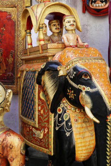 Udaipur, Rajasthan, North India, India, Asia, An elaborately decorated elephant figure with detailed riders and colourful patterns