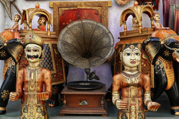 Udaipur, Rajasthan, North India, India, Asia, Detailed decorated traditional figures and a gramophone in a display
