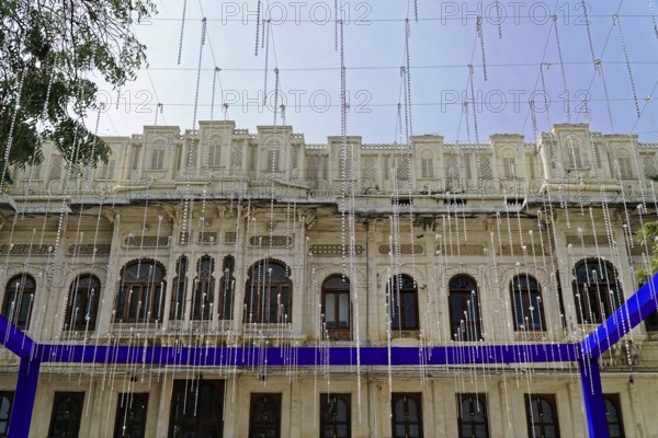 Udaipur, Rajasthan, North India, Asia, Building with decorative fairy lights and blue curtains for an event