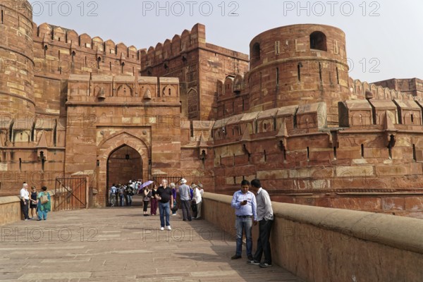 Red Fort, Agra, Uttar Pradesh, India, Visitors standing on a pavement in front of a historic fort, Jodhpur, Rajasthan, North India