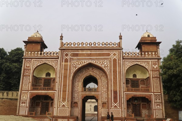 Tomb of Akbar the Great, Sikandra, Agra, Uttar Pradesh, North India, India, Asia, Richly decorated red sandstone gate in traditional Mughal style, Jodhpur, Rajasthan