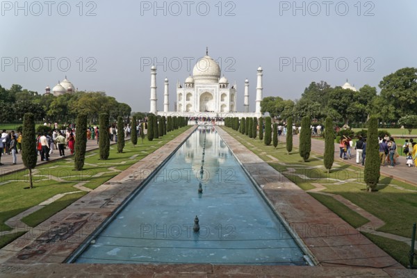 Taj Mahal Tomb, UNESCO World Heritage Site, Agra, Uttar Pradesh, India, Asia, Famous mausoleum by the river, Beautiful view of the Taj Mahal with reflecting pool of water in the garden, Rajasthan, North India, White marble dome of the Taj Mahal with gardens and pool of water under a clear sky, Jodhpur