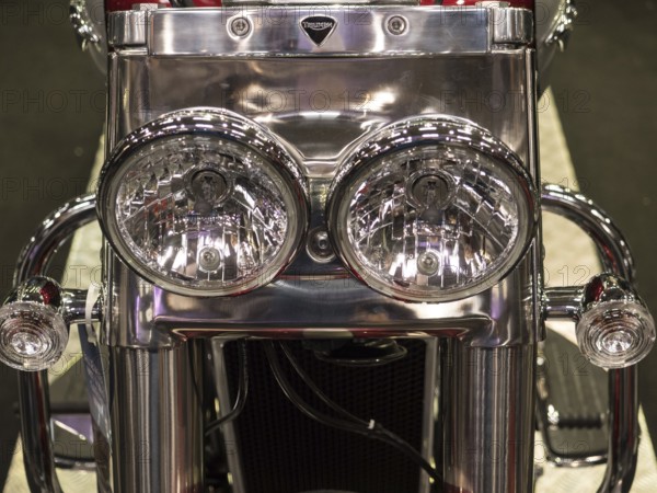 Shiny chrome double headlights of a motorbike in retro style, dortmund, deutchland
