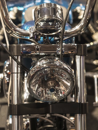 Front view of a motorbike with dominant chrome headlights, dortmund, deutchland