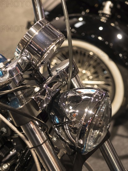 Shiny chrome headlight of a classic motorbike, dortmund, deutchland