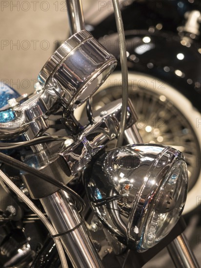 Detailed view of chrome-plated headlights of a vintage motorbike, dortmund, germany