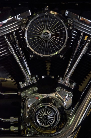Detailed motorbike engine with accentuated shiny chrome fans and valves, dortmund, germany