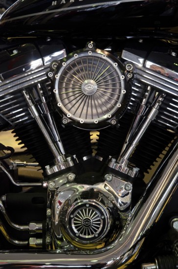 Close-up of a shiny chrome motorbike engine, emphasising the technical precision and robust style, dortmund, germany