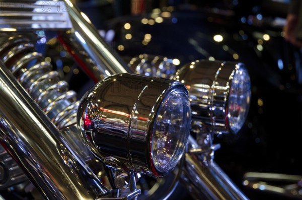 Close-up of sparkling chrome headlights on a motorbike, dortmund, germany