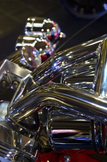Close-up of shiny chrome parts and mechanical details of a motorbike, dortmund, germany