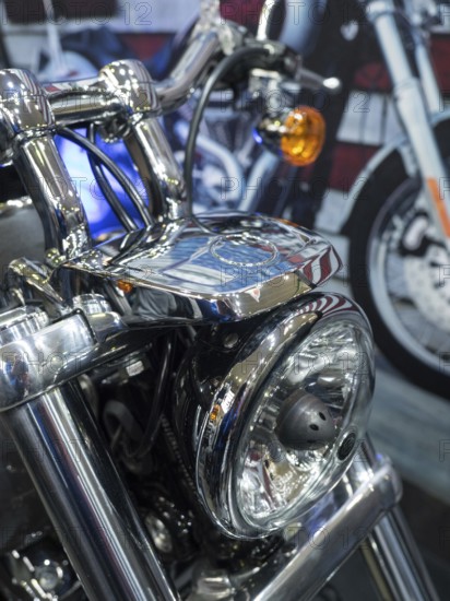Detailed view of a motorbike headlight with chrome applications, Dortmund, Germany