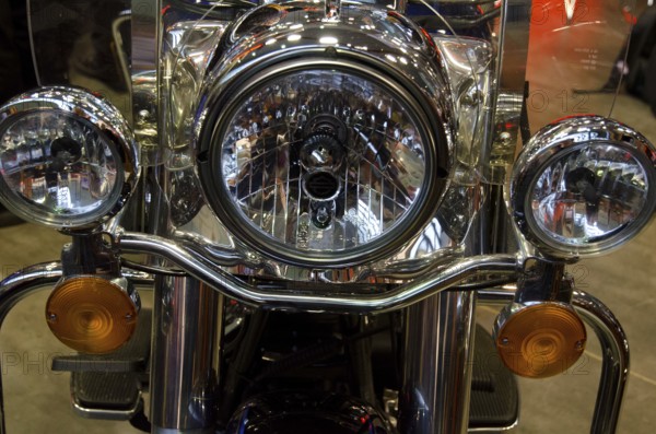 Front view of a motorbike with large chrome headlights, dortmund, germany