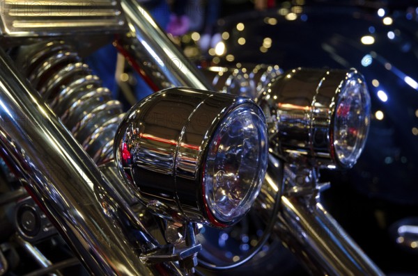Close-up of shiny chrome headlights of a motorbike in detail, dortmund, germany