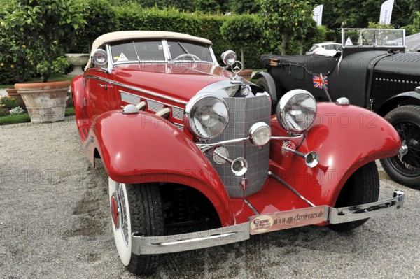 Mercedes-Benz 540K Special Roadster, built in 1938, classic car, red Mercedes classic car with shiny bodywork, convertible style, parked on a gravel road, Retro Classics meets Baroque, Ludwigsburg, Baden-Württemberg, Germany